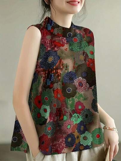 Áo kiểu nữ không tay dáng suông, dài vừa phải, cổ đứng, họa tiết hoa rực rỡ, thích hợp cho mùa hè.