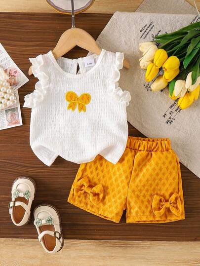 2pcs Baby Girl Summer Fashion Bow Decor Ruffle Trim Sleeveless Top And Patch Elastic Waist Casual Shorts Set