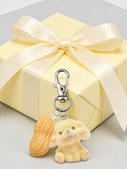 小狗花生挂件钥匙扣，可爱萌犬吊坠钥匙圈，带龙虾扣，是装饰手提包、背包、行李箱和钥匙的理想之选，适合青少年、时尚爱好者，也适合日常通勤、上学、旅行、宠物主题活动和送礼，采用耐用的植绒树脂和合金材质，小巧便携，可用作包包挂饰或钥匙扣配件。