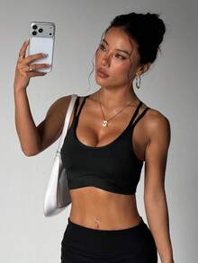 Sujetador deportivo sin costuras para mujer, de unicolor, con almohadillas extraíbles y espalda cruzada - Negro - Ver 3