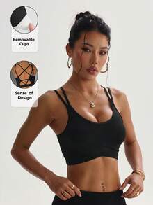 Sujetador deportivo sin costuras para mujer, de unicolor, con almohadillas extraíbles y espalda cruzada - Negro - Ver 1