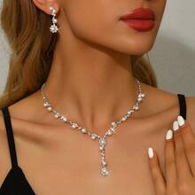 Bộ trang sức cưới tối giản gồm vòng cổ, bông tai và vòng tay đính ngọc trai giả và đá pha lê, thích hợp cho phụ nữ dự tiệc cưới. - bộ trang sức - Xem 2