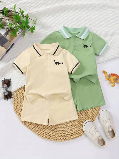 Set de 4 piezas de top de manga corta con cuello polo y shorts con estampado de dinosaurio, de estilo deportivo casual para niños, multicolor