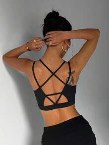 Sujetador deportivo sin costuras para mujer, de unicolor, con almohadillas extraíbles y espalda cruzada - Negro - Ver 2