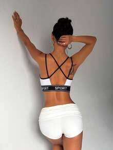 Women's Solid Color Removable Padded Criss-Cross Back Sports Knit Bra - Black and White - View 4