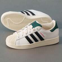 Adidas 女士低帮系带运动鞋，SUPERSTAR II 休闲鞋，轻便运动鞋，适合日常穿着 - 白色/黑色/乳白色 - 查看 2