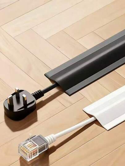 3.8cm/5.5cm Wide Self-Adhesive PVC Cable Raceway, This Low-Profile, Surface-Mounted Raceway Design Can Withstand Foot Traffic, Providing Neat And Concealed Protection For Your Power Cords, Ethernet Cables, And Extension Cords. It Also Features Waterproof Properties For Long-Term Use.