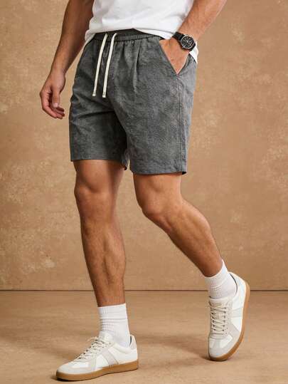 男士夏季新款时尚休闲刺绣字母轻薄短裤，适合日常通勤和度假穿着