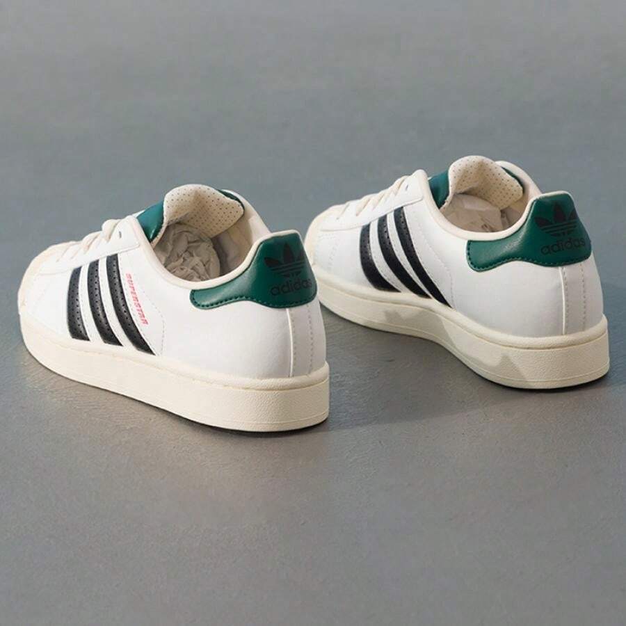 Adidas 女士低帮系带运动鞋，SUPERSTAR II 休闲鞋，轻便运动鞋，适合日常穿着 - 白色/黑色/乳白色 - 查看 1