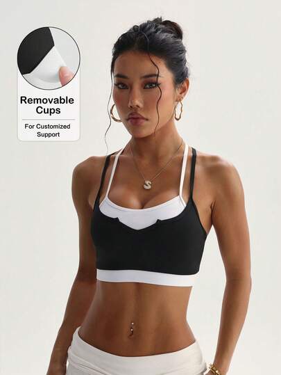 Sujetador deportivo de punto de unicolor con almohadillas extraíbles y espalda de tirantes para mujer