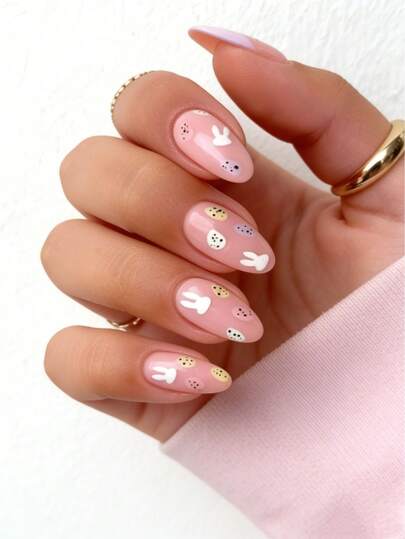 复活节主题24片长杏仁形亚克力美甲贴片，饰有白色兔子蛋图案，包含1片果冻胶和1个指甲锉，适合派对、活动和日常佩戴。适合女性和女孩。包含美甲工具。可塑形美甲套装