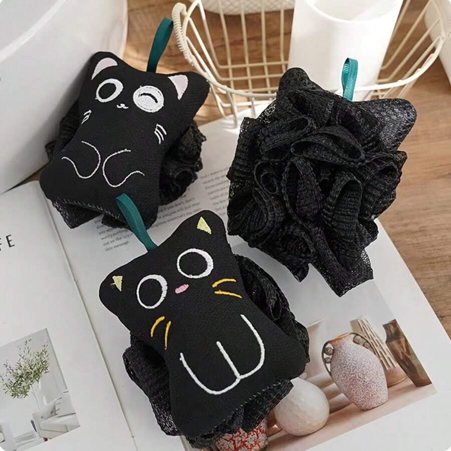 可爱黑色猫咪造型沐浴球，配有挂绳和柔软网状身体磨砂巾。猫咪双面沐浴球磨砂巾。A面为磨砂面，可深层清洁；B面可快速产生5秒柔滑泡沫。 - 彩色 - 查看 1