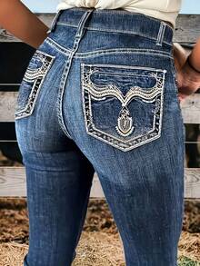 Plus-Size Women's Western Retro High-Waisted Flared Jeans With Exposed Stitching And Embroidery. Suitable For Everyday Wear, Office, Vacation, And Airport. Features Include Zipper And Button Pockets, Autumn/Winter Style, Distressed Finish, High-Waisted Flared Design, White Decorative Stitching, Retro Embroidery Pattern, Vintage Pockets, Floral Draped Flared Jeans, And A Classic High-Waisted, Slimming Denim Silhouette. - Medium Wash - View 9