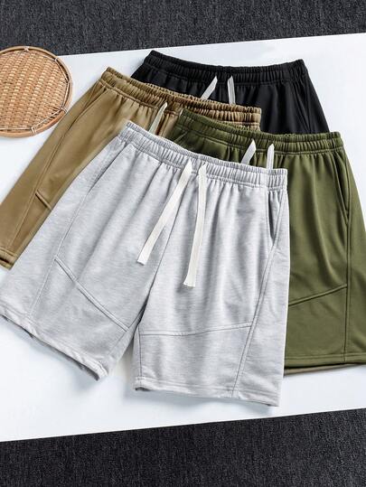 男士宽松休闲运动短裤，适合健身、篮球、训练、跑步、锻炼、街头、露营、海滩等场合，弹性腰带设计搭配抽绳，可调节松紧。