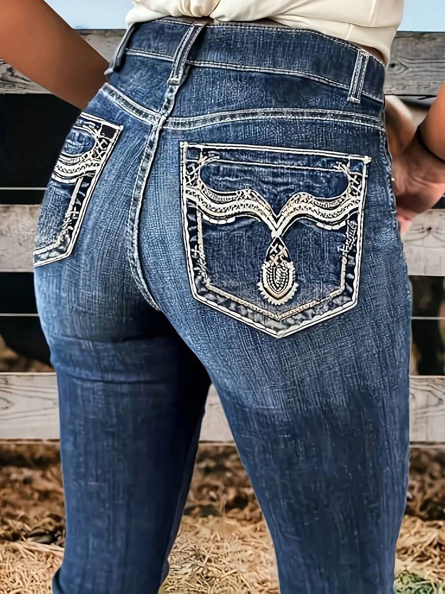 Plus-Size Women's Western Retro High-Waisted Flared Jeans With Exposed Stitching And Embroidery. Suitable For Everyday Wear, Office, Vacation, And Airport. Features Include Zipper And Button Pockets, Autumn/Winter Style, Distressed Finish, High-Waisted Flared Design, White Decorative Stitching, Retro Embroidery Pattern, Vintage Pockets, Floral Draped Flared Jeans, And A Classic High-Waisted, Slimming Denim Silhouette. - Medium Wash - View 1