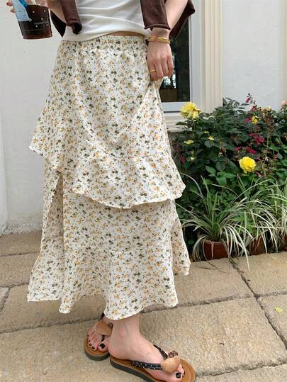 不对称荷叶边黄色碎花高腰A字裙，法式优雅修身夏季女装