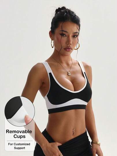 Áo ngực thể thao nữ màu trơn cổ tròn, có đệm mút rời, không lưng, chất liệu dệt kim.