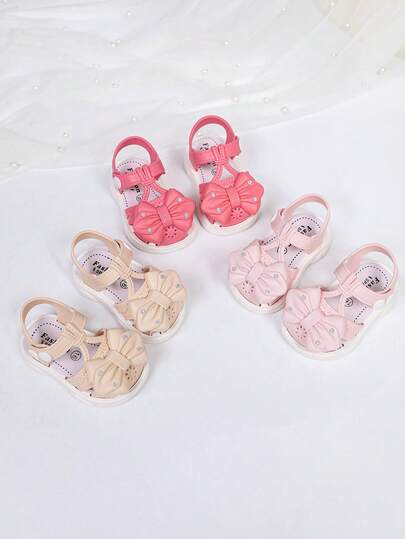 1双春夏新款婴儿凉鞋，蝴蝶结装饰露趾凉鞋，男女童款魔术贴防滑软底舒适沙滩拖鞋，适合室内外穿着