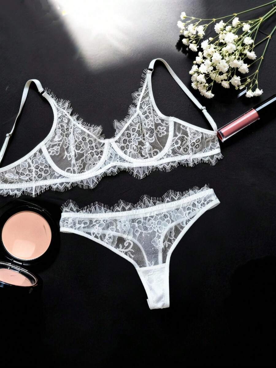 Bộ đồ lót ren trắng 2 món, với lớp lưới xuyên thấu và điểm nhấn ren hoa tinh tế, dây đeo có thể điều chỉnh + thiết kế quần cạp cao, thanh lịch nhưng tôn dáng, thoải mái nhưng vẫn gợi cảm, có nhiều kích cỡ phù hợp với nhiều dáng người, kiểu dáng có gọng giúp nâng đỡ tối đa, nâng tầm vẻ sang trọng hàng ngày của bạn. - trắng - Xem 1