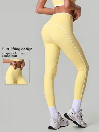 Pantalones de yoga cómodos y versátiles para mujeres con cintura cruzada de color contrastante, adecuados para entrenamiento de alta intensidad y carrera