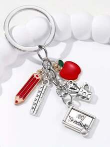 1 pieza Llavero conmemorativo del Día del Maestro con manzana roja, lápiz, paleta, regla, portaplumas - Plateado - Ver 3