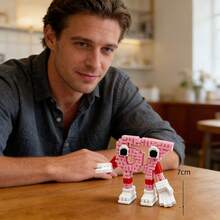 1个可爱的67号主题伙伴机器人摆件，眼睛表情丰富，采用耐用塑料材质，室内/室外皆可摆放，适用于家居、办公室或收藏展示，趣味设计，细节雕刻精美。 - 彩色 - 查看 7