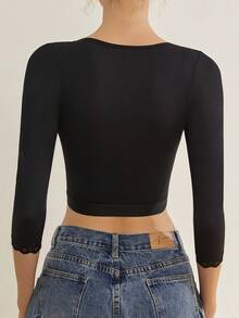 Top moldeador de brazos SlimSculpt con mangas 3/4 | Cierre frontal, control de abdomen y soporte postural para mujer - Negro - Ver 2