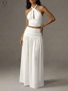 Bộ đồ 2 mảnh dành cho nữ, áo tank top ngắn tay chất liệu vải dệt họa tiết xoắn phía trước kết hợp với chân váy maxi xếp ly, trang phục dự tiệc đi biển thanh lịch cho mùa hè. Màu trắng. - trắng - Xem 4