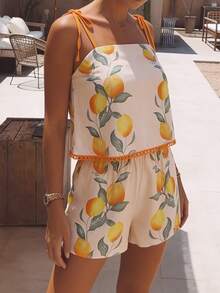 Bộ đồ nữ thanh lịch, thoải mái, thích hợp cho các chuyến đi chơi và du lịch, với họa tiết chanh mùa xuân/hè, in chìm, phối màu độc đáo và viền bèo nhún. - Nhiều màu - Xem 3