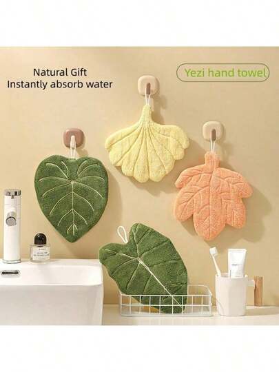 这款广受欢迎的叶形挂式手巾采用加厚珊瑚绒面料制成，吸水性强，不易掉毛。独特可爱的叶形设计，配有挂绳，方便悬挂和收纳。