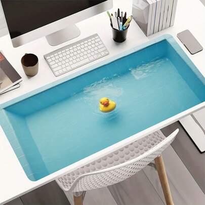 这款可爱的鸭子主题防滑游戏鼠标垫，采用橡胶材质，非常适合家庭和办公室使用。它设计时尚，是送给游戏玩家和专业人士的绝佳礼物，也是提升工作空间的理想之选。