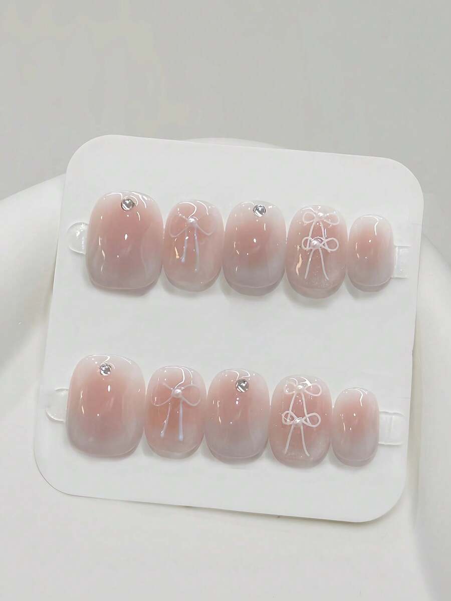 10 Stück reine handgefertigte Aufklebe-Nägel, kurze Nägel, ovale Nägel, rosa Nägel, sanfter und zarter Stil, eisig-transparentes rosa Katzenauge-Farbverlauf mit handbemalter süßer Schleife und zerkleinerten Diamant-Verzierungen, minimalistisch süße Aufklebe-Nägel für Frauen und Mädchen, für Frühling, Sommer, Herbst, Winter, Festivals, Partys und den Alltag - Pink - Übersicht 1