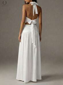 Bộ đồ 2 mảnh dành cho nữ, áo tank top ngắn tay chất liệu vải dệt họa tiết xoắn phía trước kết hợp với chân váy maxi xếp ly, trang phục dự tiệc đi biển thanh lịch cho mùa hè. Màu trắng. - trắng - Xem 2