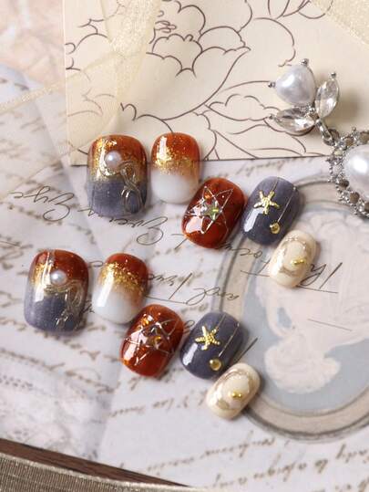 10片装棕蓝渐变星光美甲贴片，包含1张粘性贴片和1个迷你指甲锉，手工制作。