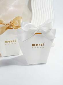 10个简约感谢礼盒，配缎带蝴蝶结，“Merci Beaucoup”金色字样纸质礼品盒，适用于婚礼、新娘送礼会、婴儿送礼会、派对回礼、糖果礼品和优雅活动包装。 - 6X6X10cm - 查看 1