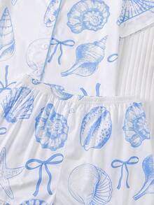 Bộ đồ ngủ trẻ em mùa hè kiểu dáng đại dương, chống cháy, gồm 2 món: áo khoác cardigan tay ngắn cổ bẻ và quần short cạp chun rộng rãi, nền trắng phối họa tiết đại dương xanh và vỏ sò, bộ đồ ngủ mặc nhà thoải mái, rộng rãi cho trẻ lớn. - trắng - Xem 4