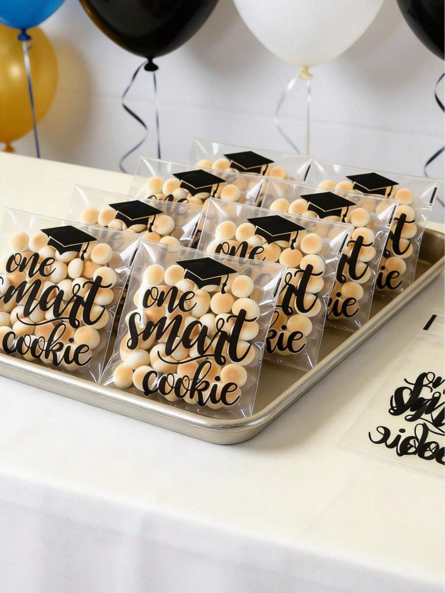 100pcs Graduation Gift Bags, Transparent Graduation Cap Pattern Gift Packaging Bags, Graduation Party Favor Bags, Congratulations 2026 Graduation, Graduation Decoration, Graduation Cookies Baking Bags, Graduation Candy Bags, Graduation Celebration Desktop Decor, Graduation Dessert Bags, Graduation DIY Packaging Supplies, Graduation Gifts, Party Favors