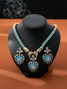 一套优雅迷人的蓝色海洋心形吊坠小众奢华珠宝套装，包括项链和耳环，适合女性佩戴。 - 彩色 - 查看 5