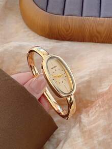 1 chiếc đồng hồ nữ thạch anh hình bầu dục, thanh lịch và thời trang, phù hợp để đeo hàng ngày, cũng có thể là quà tặng sinh nhật/tốt nghiệp, phụ kiện cho các buổi gặp gỡ và tiệc tùng thường ngày. - Vàng - Xem 2