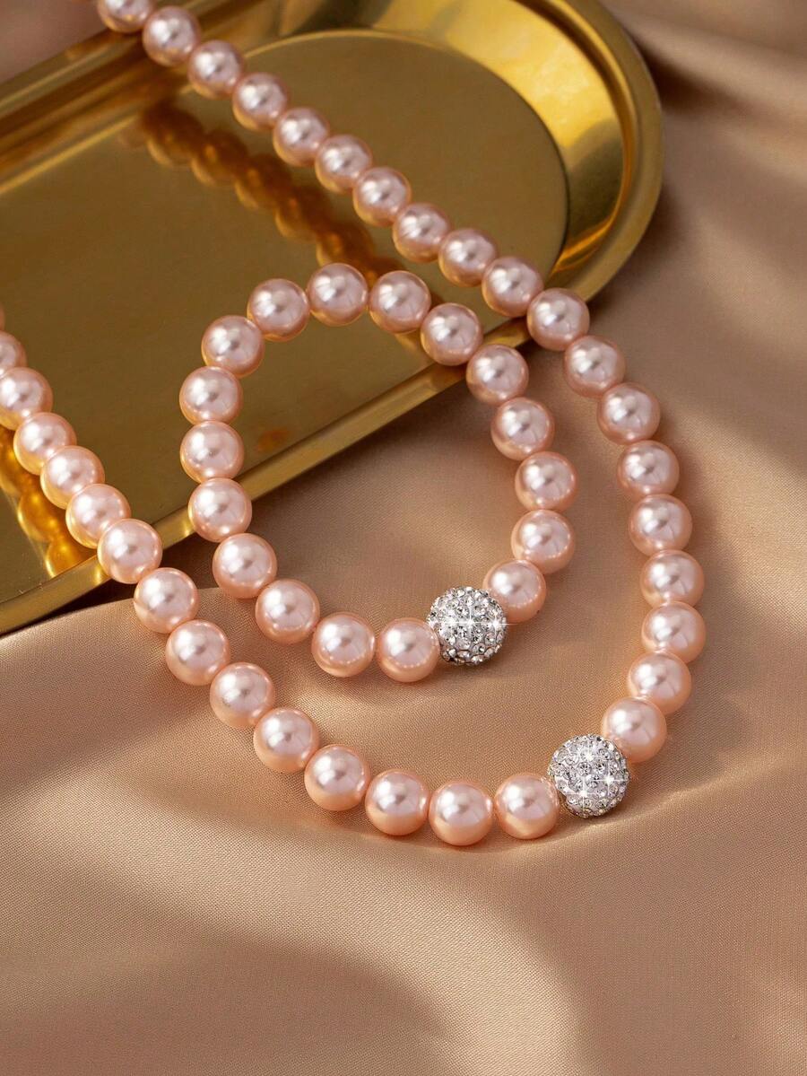 Bộ trang sức nữ, thiết kế tối giản thanh lịch với dây chuyền và vòng tay đính ngọc trai giả bất đối xứng, thích hợp để đeo hàng ngày và làm quà tặng.