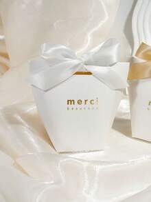 10个简约感谢礼盒，配缎带蝴蝶结，“Merci Beaucoup”金色字样纸质礼品盒，适用于婚礼、新娘送礼会、婴儿送礼会、派对回礼、糖果礼品和优雅活动包装。 - 6x6x10cm - 查看 4