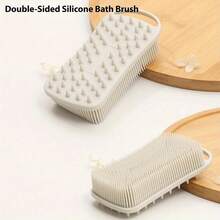 这款硅胶头皮按摩刷，集温和设计、精湛工艺和多功能用途于一体，旨在为您带来水疗级的沐浴体验，并促进头发和皮肤的健康。多功能设计是这款沐浴刷的另一大亮点，它既可用作头皮按摩器，也可用作身体去角质刷。 - A - 查看 1