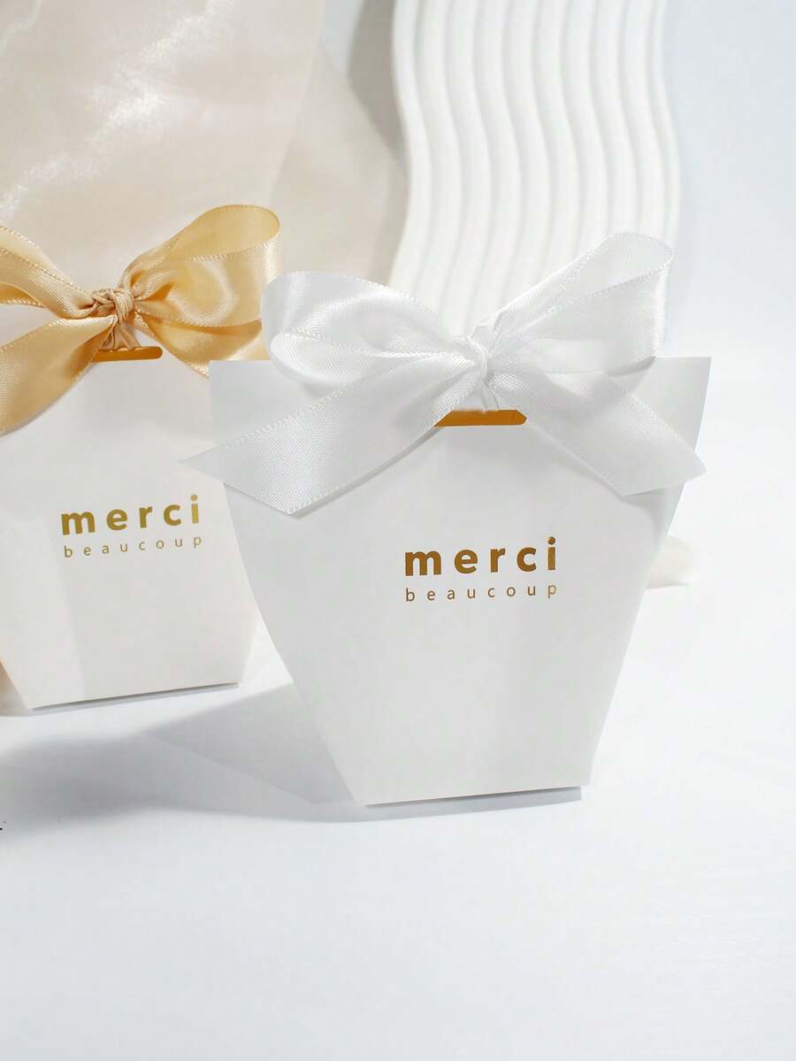 10个简约感谢礼盒，配缎带蝴蝶结，“Merci Beaucoup”金色字样纸质礼品盒，适用于婚礼、新娘送礼会、婴儿送礼会、派对回礼、糖果礼品和优雅活动包装。 - 6x6x10cm - 查看 1