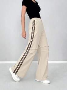 Pantalones casuales de poliéster de pierna ancha y largos para mujer con cinta lateral de leopardo y bolsillos, perfectos para uso diario. - Albaricoque - Ver 4