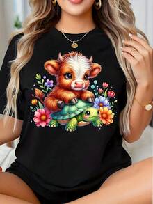 Cute Cow Riding Turtle With Flowers Graphic T-Shirt For Women, Animal Print Top With Whimsical Design, Perfect Gift For Nature Lovers And Animal Enthusiasts - Black - View 1