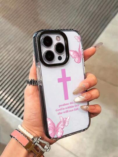 1个“诗篇46:5 神在她里面，她必不至动摇”基督教手机壳，透明机身搭配黑色软边框和黑色镜片边框，防摔保护壳，饰有粉色十字架和蝴蝶图案，少女心十足的设计，兼容 12/15/16/16 Plus/17/17 Pro/17 Pro Max，适合基督徒、女孩、母亲节、生日及日常使用，快速发货