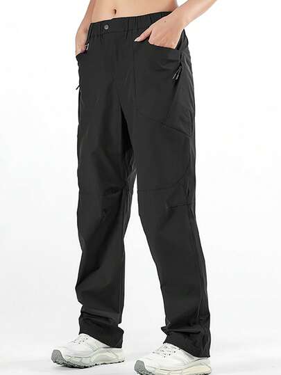 女士夏季冰丝尼龙速干轻便防晒户外徒步裤，多拉链口袋设计，全拉链门襟，全弹力腰带和可调节弹力抽绳裤脚，透气吸湿，适合徒步、露营、背包旅行、登山和旅行等户外活动。