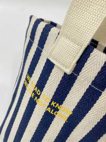 时尚简约女士小手提包，休闲帆布迷你托特包，轻便可折叠方形包，黑色字母个性化设计，可装钥匙、水瓶、手机和个人物品，适合外出、遛宠物等场合。 - 藏蓝色 - 查看 9