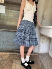 1 Piece [Showa Retro Cute] Elegant, Like Something Made In Japan. Blue Check Tiered Mini Skirt. The High Waist And Elastic Detailing Create A Clean, Summery Look. Perfect For A Summer "Dopamine" Look! This Refreshing Blue Check Cake Skirt Features A Soft Silhouette And A High Elastic Waist For Ease Of Movement And Exceptional Cuteness. Blue Check Cake Skirt, Mini, High Waist, Elastic Knit, Summer, Retro, Everyday, Cute, Dopamine, Thick, Japanese-Style, Casual, Matching Set, Ruffle Hem, Cutout, Ruffles. - 藏蓝色 - 查看 5