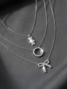 3件套铜锆石水晶蝴蝶结泰迪熊耳环吊坠项链套装，适合女性，可作为友谊、情人节或生日礼物。 - 項鍊套裝 - 查看 2